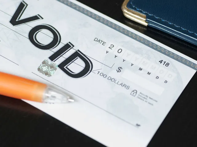 A voided personal paper check
